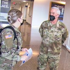 Col. Brad Wenstrup, a US Congressman and Guard member, speaks with another Guard member at The Christ Hospital in Cincinnati, Oh