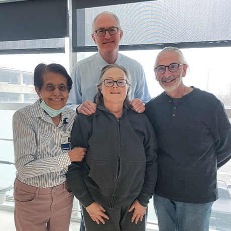 Heart transplant patient Terri Cecere with Geetha Bhat, MD, Rob Dowling, MD, and Terri's husband George