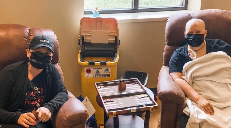 Lauren and Leanne play backgammon during an infusion appointment