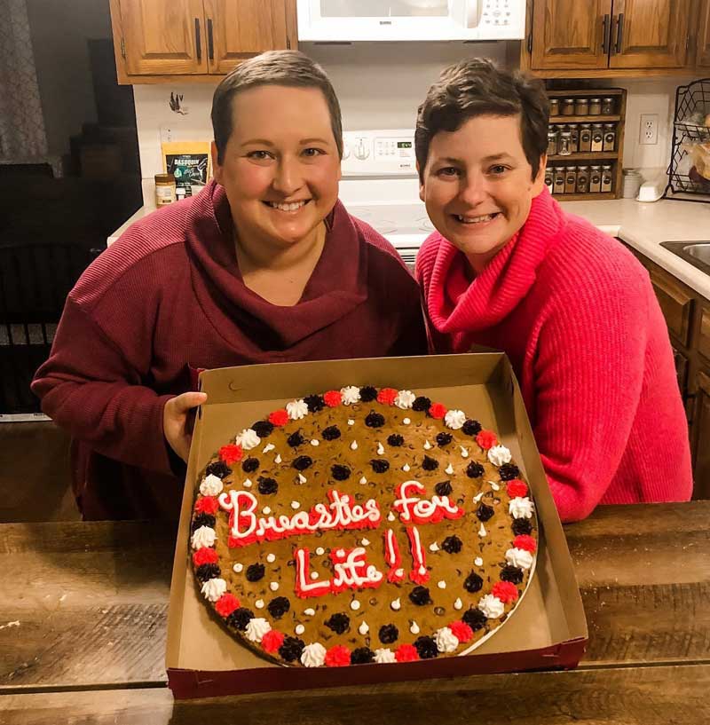 Leanne and Lauren display cookie cake decorated with Breasties for Life!!