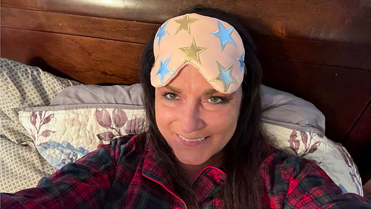 Chelsie from B105 wears a sleep mask in bed