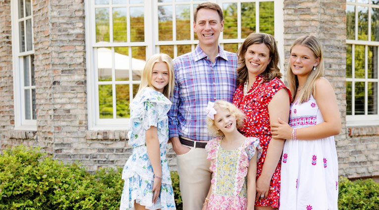 Carrie Lang with her husband and children