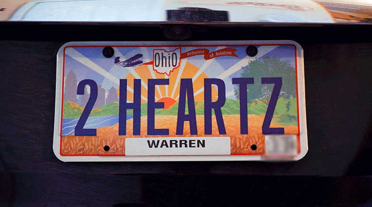 License plate on the Cecere's car says 2 Heartz based on the Bruce Springsteen song