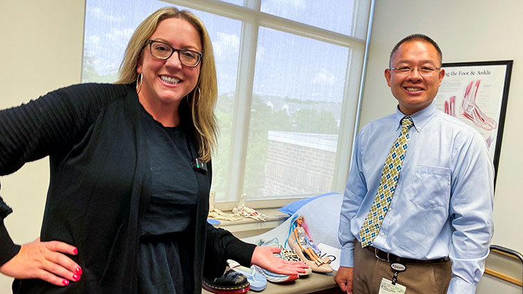 Q102's Jennifer Fritsch with Jeffrey Wu, MD, in an exam room discussing footwear