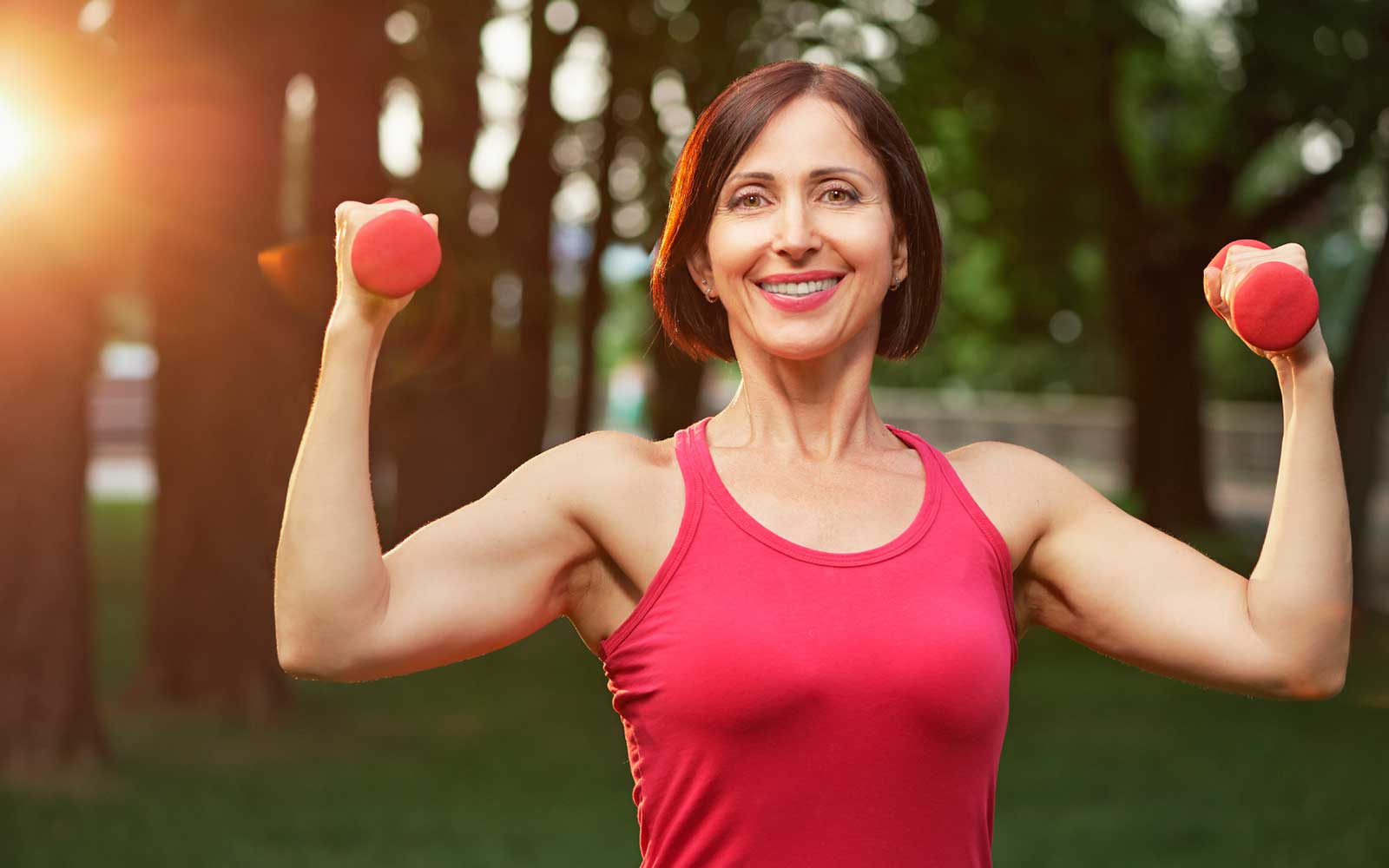 Middle aged woman exercising outdoors.