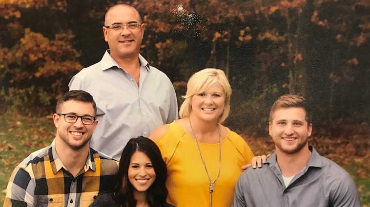 Zachary Ranley, PA, and his family, outdoors.