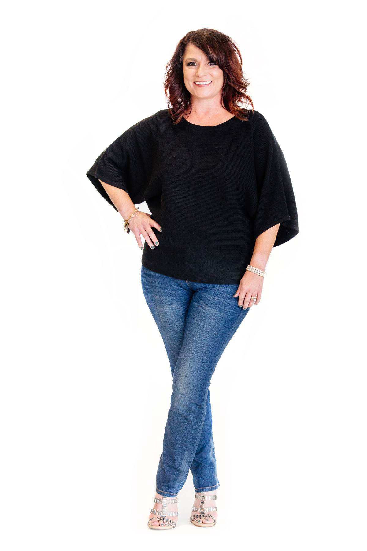 B105 radio personality Chelsie wearing a black top and jeans, for her blogs with Healthspirations.