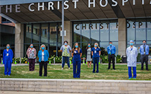Members of The Christ Hospital's Sepsis Taskforce stand out front of the hospital. 