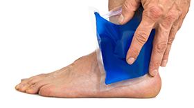 Person with ice pack on ankle