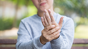 Woman with hurt wrist