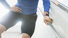 Exercising man with hip pain