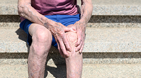 Older man with knee pain