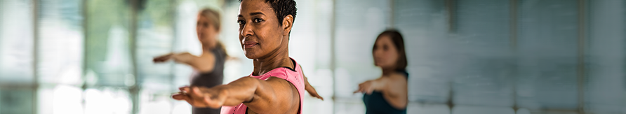 African American woman doing yoga | The Christ Hospital Cancer Services 