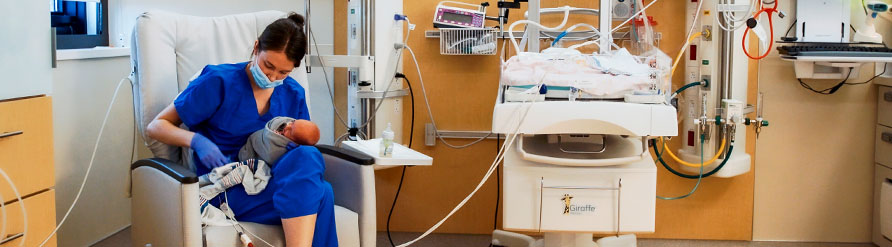 Nurse with newborn in NICU at The Christ Hospital