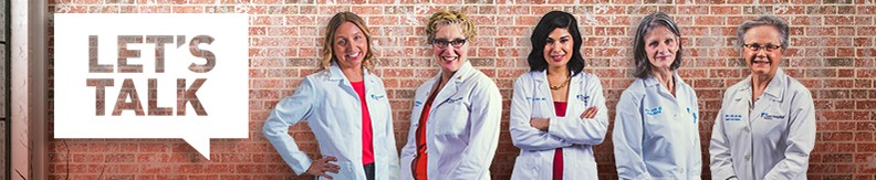 Women's health experts at The Christ Hospital stand in front of a brick wall for the Let's Talk series.