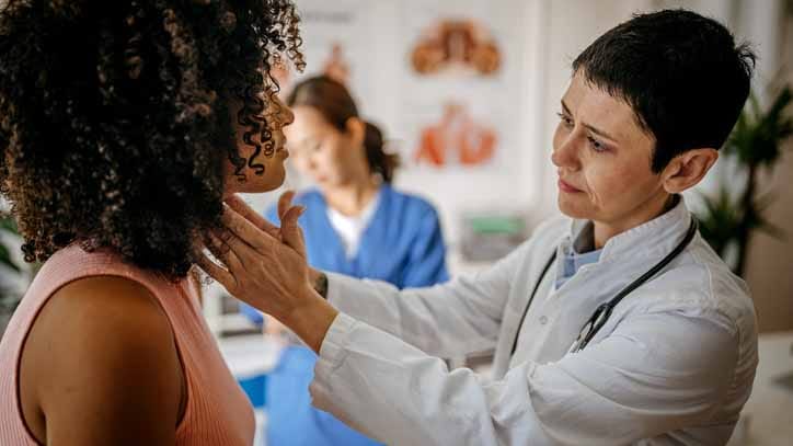 Women being checked out by her doctor.
