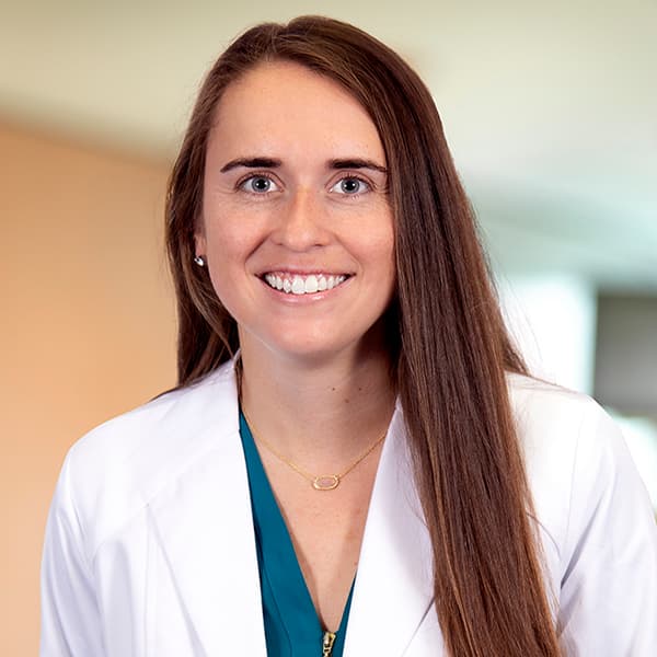 DELOZIER Natalie whitecoat 600x600.jpg